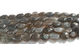 Grey Moonstone Oval 10x13 MM , Length of strand 15", Moonstone oval beas, origin is India .