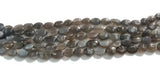 Grey Moonstone Oval 10x13 MM , Length of strand 15", Moonstone oval beas, origin is India .