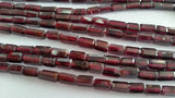 Garnet faceted Tube shape in 4x7mm , Length of strand is 14 Inch