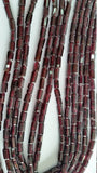 Garnet faceted Tube shape in 4x7mm , Length of strand is 14 Inch