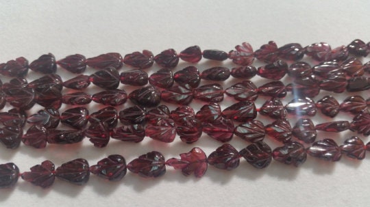 GARNET 7x9 Garnet Full Carving Pear Shape , Length 16 