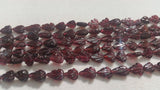 GARNET 7x9 Garnet Full Carving Pear Shape , Length 16 " , GARNET fancy shape . leaf carving .