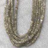 white Diamond Chips strand , length 17" Natural diamond chips, 13 carat strand , diamond beads in freeform shape .