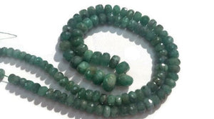 Emerald faceted roundel graduate strand 5-8mm , Longer strand of 18"