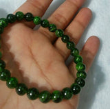 8MM Chrome Diopside Smooth Round , Very good quality Stretch Bracelet .country of origin Russia