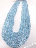 20 Inch Swiss Blue Topaz Faceted Roundel 5-10MM , Top Quality, Swiss Blue topaz faceted Beads. Listing of single strand