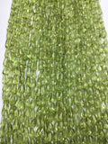 Peridot Drop Beads 3x6mm size - 14 inch length . Peridot Gemstone beads