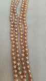 Pink Freshwater Pearl Potato shape knotted Necklace , length 50" . Top Quality pearl