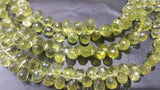 Peridot faceted drop beads 6x9 mm, length of strand 8 Inch