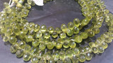 Peridot faceted drop beads 6x9 mm, length of strand 8 Inch