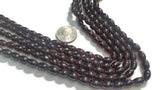 Big Garnet Smooth Rice shape 7x10MM , Length of Strand 16"