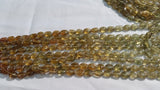 Grossural Garnet Oval Beads 6x8mm , Shaded strand of 14"