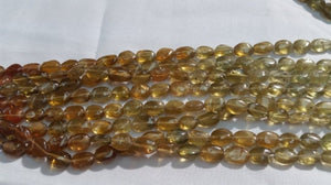 Grossural Garnet Oval Beads 6x8mm , Shaded strand of 14"