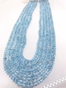 18 Inch Swiss Blue Topaz Faceted Roundel 5-10MM , Top Quality, Swiss Blue topaz faceted Beads. Listing of single strand