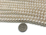 11 mm Freshwater Pearl Cultured Roundel shape Pearl .Natural Freshwater Button Beads , AAA Grade - length 40cm