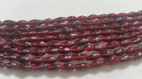 Garnet smooth dholki shape 4X7M , Natural Good Quality Garnet Beads , Indian garnet beads .