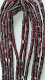 Garnet faceted Tube shape in 4x7mm , Length of strand is 14 Inch