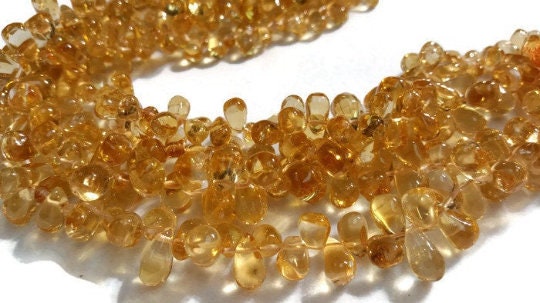 Citrine Smooth Drop Shape ,Size 4X7 MM Good Color , origin from Brazil . natural citrine , gemstone shapes , length 15