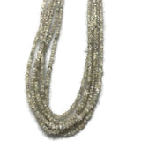 white Diamond Chips strand , length 17" Natural diamond chips, 13 carat strand , diamond beads in freeform shape .