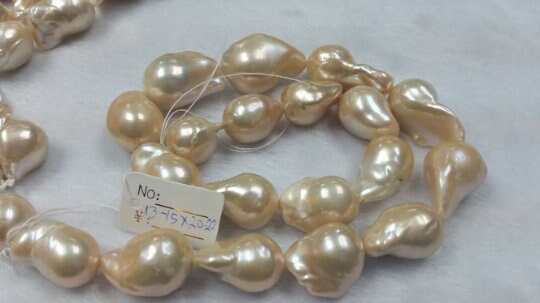 Freshwater Cultured Pink / Golden Pearl Baroque shape Good Quality Pearl .Natural Freshwater pearl , AAAA Grade Size 13-15X20-25MM Approx