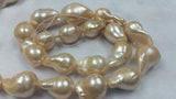 Freshwater Cultured Pink / Golden Pearl Baroque shape Good Quality Pearl .Natural Freshwater pearl , AAAA Grade Size 13-15X20-25MM Approx