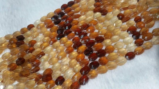Hessonite Faceted Flat Oval Shape graduated, Size of beads 7X9MM