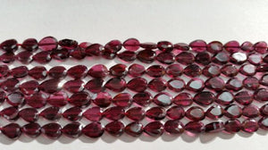 Garnet Flat faceted Pear 5x7mm Straight Drill, length of strand 15"