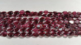 Garnet Flat faceted Pear 5x7mm Straight Drill, length of strand 15"