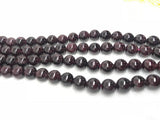 8MM Garnet Smooth Round ,A Quality , length 16" Natural garnet beads . Garnet smooth shape