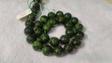 13 MM Chrome Diopside  Round beads Very good quality in 15" Length country of origin Russia