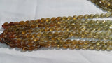 Grossural Garnet Oval Beads 6x8mm , Shaded strand of 14"