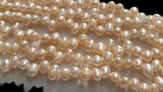 White Freshwater Pearl Potato shape . size 5X7 MM , Cultured Pearl . Length 16 Inch