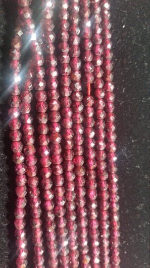 4mm Garnet Round faceted beads, length of strand 14