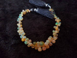 ETHIOPIAN OPAL Drop Briolettes  Size 4X5MM to 6X9 mm Top Quality drop shapes. 8 Inch Strand , Strong fire , 43 carat weight