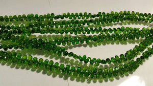 Chrome Diopside faceted Drop shape , Very good quality in 16" Length ,small briolette .size 3x4 to 3x5MM country of origin Russia