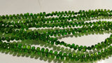 Chrome Diopside faceted Drop shape , Very good quality in 16" Length ,small briolette .size 3x4 to 3x5MM country of origin Russia