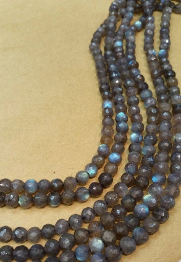 Labradorite faceted Round 6mm size ,Good quality with blue fire Length is 10