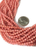 6mm Rhodochrosite Smooth Round shape. Genuine stone and perfect making with deep color . length 14 Inch . Quality AA