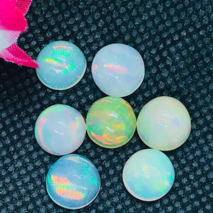 Ethiopian Opal 9MM Cabochon Code E#37- Weight 2.5 cts AAAA Quality Ethiopian Opal Round Cabs , Pack of 1 PC Video Available.