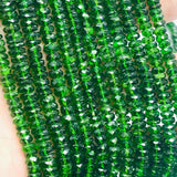 Chrome Diopside 5MM Faceted Roundel , Very good quality, length 8 Inch ,country of origin Russia , Half Strand