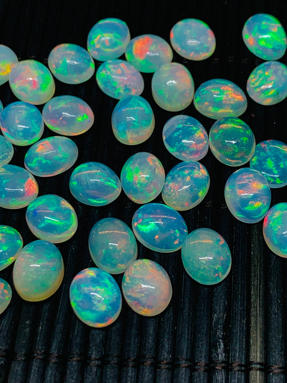 Ethiopian Opal 9X11MM Cabochon size Pack of 1 Piece - AAA Quality Yellow Color With All Colors Flash - Ethiopian Opal Oval Cabochon