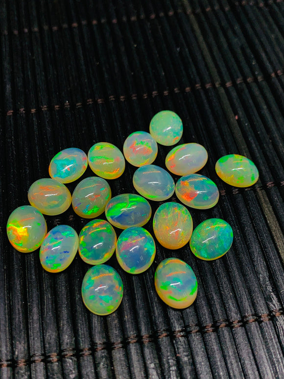 Ethiopian Opal Cabochon 8x10mm size Pack of 1 Piece - Code# A7 AAA Quality Transparent Yellow Color With Green  Yellow  Flash