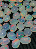 Ethiopian Opal 9X11MM Cabochon Pack of 1 Piece , AAA Quality White Transparent Color with Green Red Flash -