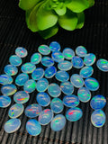 Ethiopian Opal Cabochon 8x10mm size  Pack of 1 Piece - Code# A3 AAA Transparent Quality  Blue Flash - Ethiopian Opal Oval Cabochon