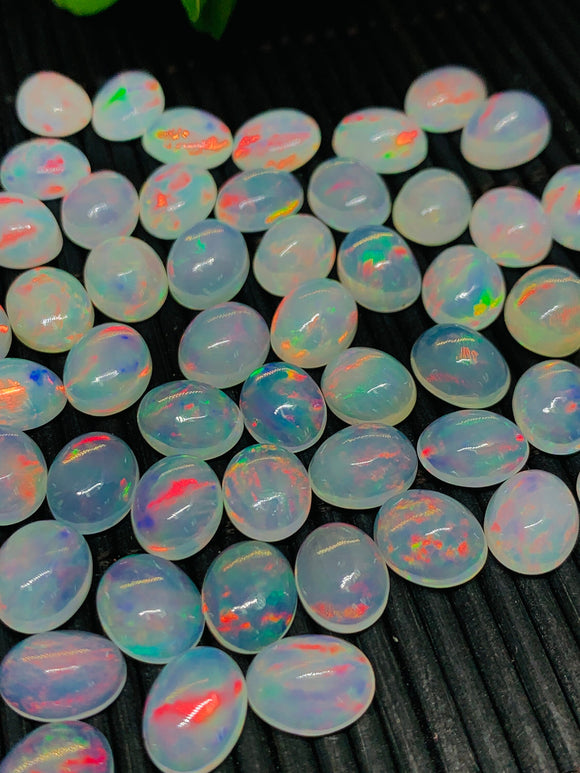 Ethiopian Opal Cabochon 8x10mm size Pack of 1 Piece - Code# A9B AAA Quality White Transparent Color with Green  Red Flash -