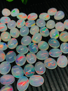 Ethiopian Opal 9X11MM Cabochon Pack of 1 Piece , AAA Quality White Transparent Color with Green  Red Flash -