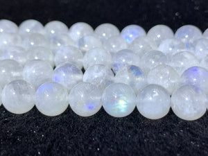 Moonstone 10MM Round Beads ,Rainbow Moonstone beads, Length 16" and AA Quality,Origin India .Fine quality and perfect round with blue flash