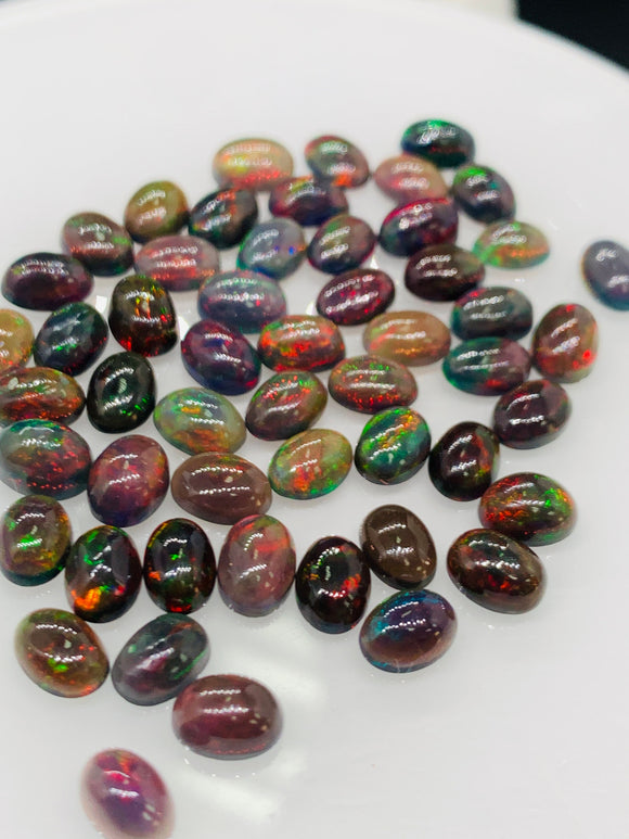 Black Opal Cabochon • 5x7 mm Size • Pack of 4 Pcs • Code B2  • AAA Quality • Natural Opal Dye Dark Red Color • Ethiopian Opal Cabs