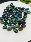 Black Opal Cabochon • 7x9 mm Size • Pack of 2 Pcs • Code B14 - AAAA Quality • Natural Opal Dark Green Treated Color • Ethiopian Opal Cabs