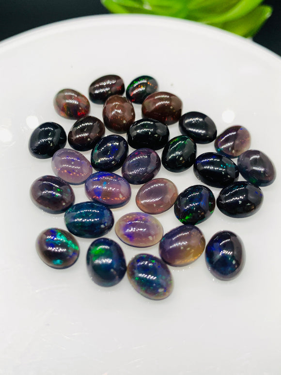 Black Opal Cabochon • 7x9 mm Size • Pack of 2 Pcs • Code B15 - AA Quality • Natural Opal Treated Color • Ethiopian Opal Cabs